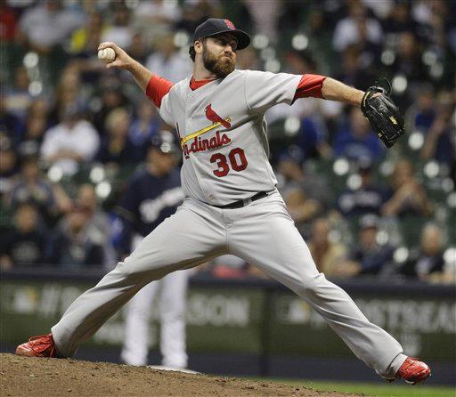 Former Iona player Jason Motte closing out the Brewers season and punching a ticket to the World Series.
