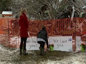 Marist students gather to mourn the death of their friends.
