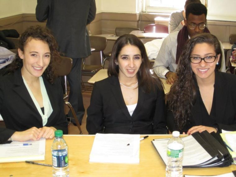 (From left to right) Juniors Kimberleigh Costanzo, Anastasia Nitis and Mary Ann Gallucci have each won individual awards for their performances as attorneys this year.