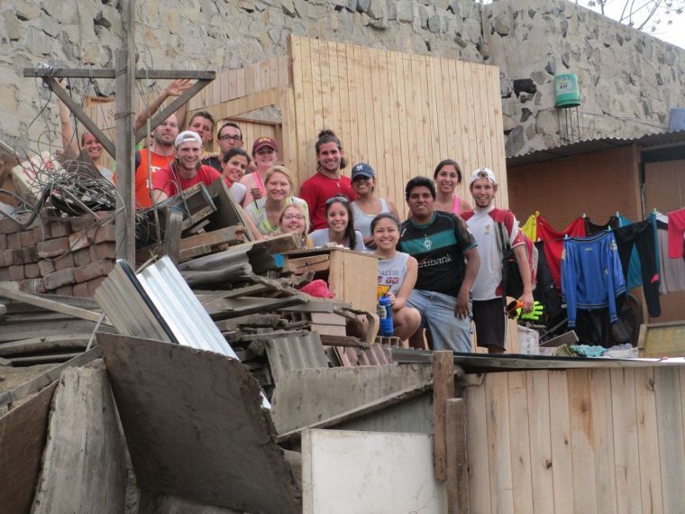The IIM: Peru team, along with the Argentines and Jorge, the carpenter who helped build the houses with the team.