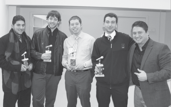 (From left) Iona class of 2014 members Nicholas Grippo and Peter Consadori, juniors Robert Boncardo and Joseph Archino and WICR advisor Michael Damergis represented the club at the Intercollegiate Broadcasting System Awards March 7.
