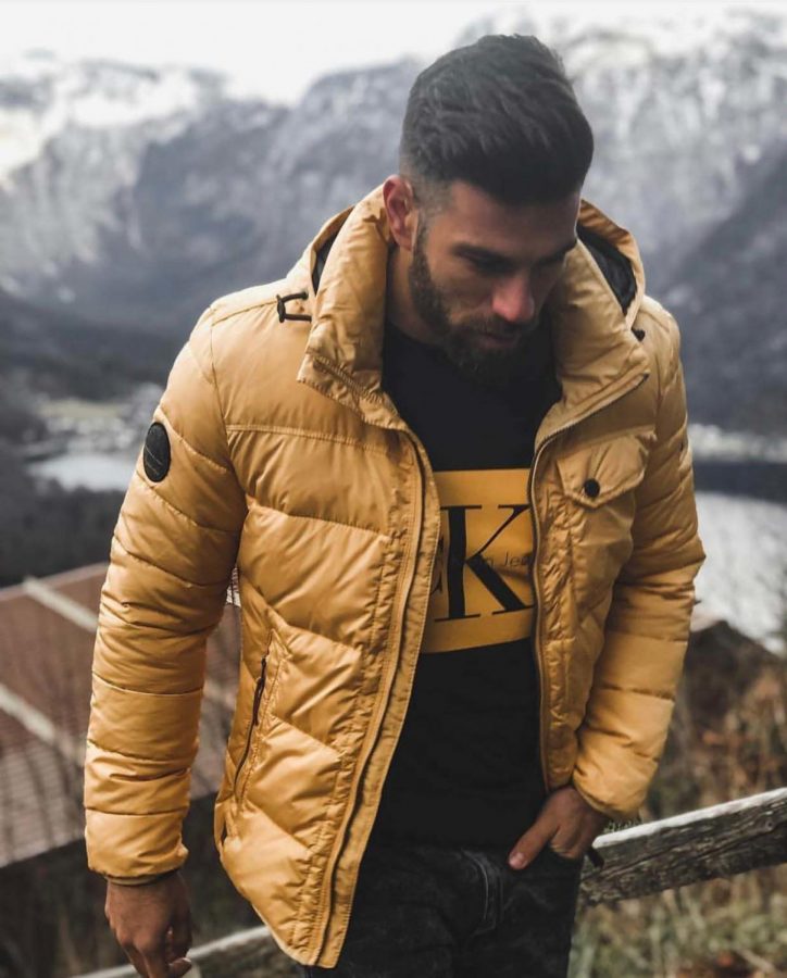 For a thicker winter coat, brands like Clavin Klein are producing puffer jackets in bright colors.