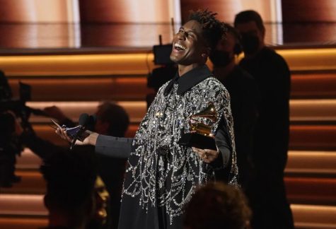Jon Batiste accepts the award for album of the year.