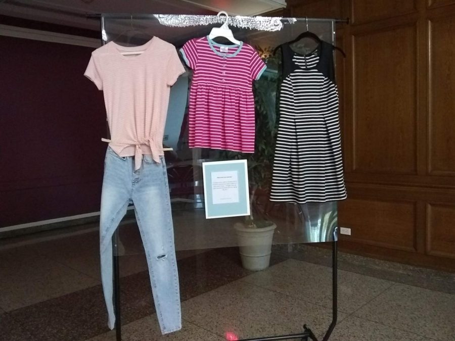 Outfits similar to those worn by victims were displayed in Burke Lounge to show that clothing does not matter for the perpetrator.