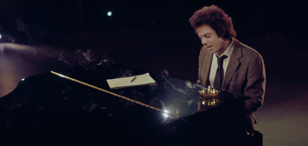 Photo from “Turn the Lights Back On” official music video. The music video made use of AI de-aging to show the various stages of Joel’s music career and life. 

Billy Joel returns from a 17-year hiatus with the debut of his new single “Turn the Lights Back On”.