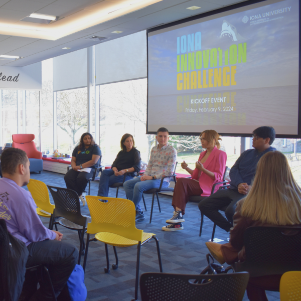 Photo taken by Eileen Cordero. A panel of past IIC participants and Hynes Institute staff speak about the value of the Iona Innovation Challenge for transforming a business idea into reality.