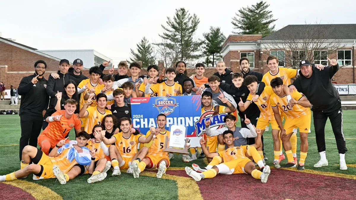 The Iona men’s soccer team celebrating their MAAC Championship win.